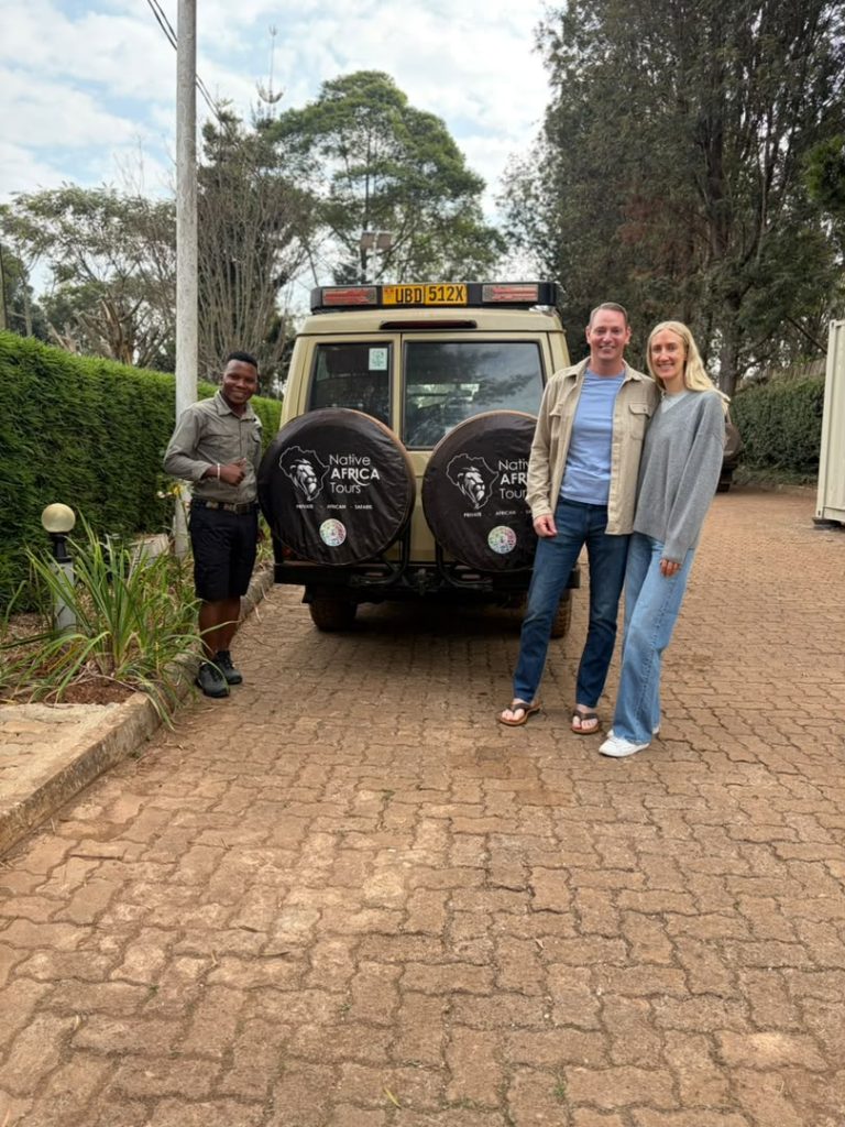 Can I Combine Gorilla Habituation with a Uganda Safari?Travelers with a safari guide and Native Africa Tours vehicle in Uganda